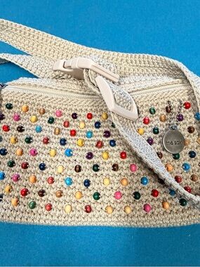 The Sak Cream Crochet Crossbody Bag with Multicolored Bead Accents